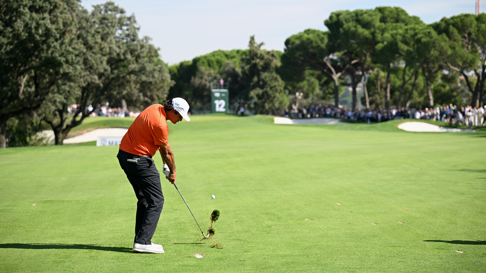 Eugenio Chacarra hits a shot off the fairway