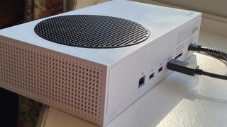 Xbox Series S showing the back ports and top fan