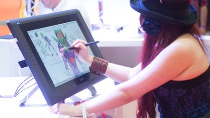 Artist using a Wacom pen and tablet