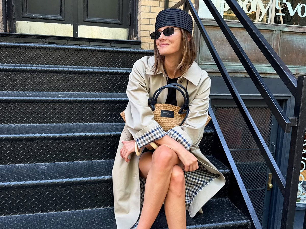 Coco Schiffer wearing a Sezane trench coat in NYC