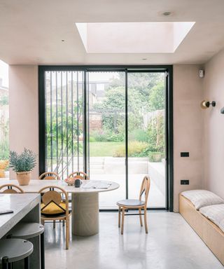 East London modern house with pink plaster walls throughout