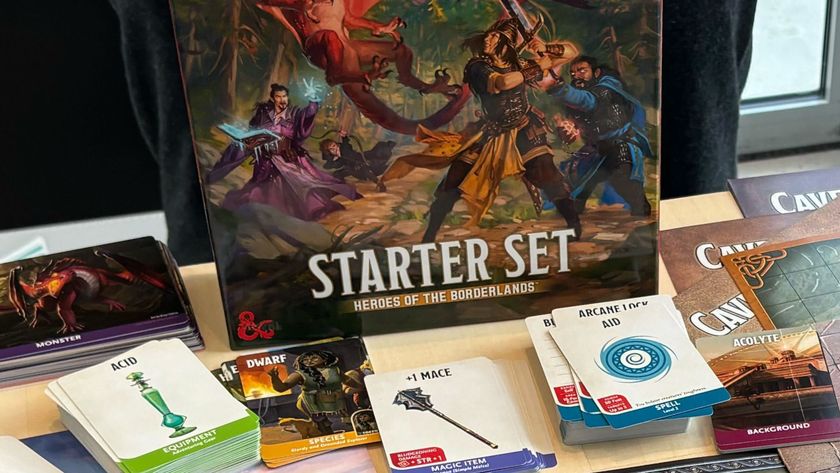 The D&amp;D Starter Set: Heroes of the Borderlands box on a table in front of assorted cards and maps