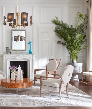 living room rug ideas with cream patterned rug by Jonathan Adler