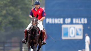 King Charles playing polo