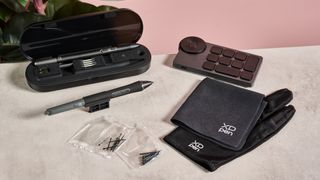 A close-up of some accessories that come with the XPPen drawing display.