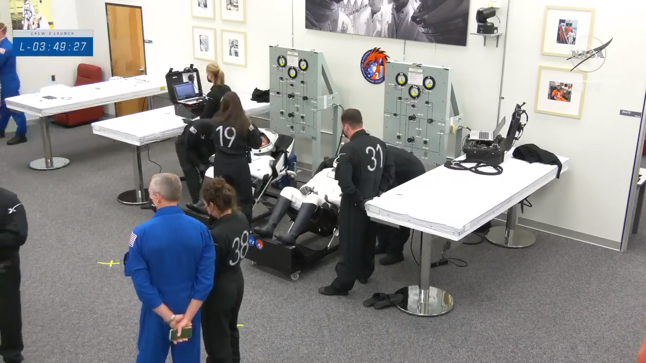 The SpaceX Crew-2 astronauts suit up inside the Neil Armstrong Operations and Checkout Building at NASA's Kennedy Space Center in Florida, on April 23, 2021.