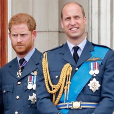 Meghan, Duchess of Sussex, Prince Harry, Duke of Sussex, Prince William, Duke of Cambridge and Catherine, Duchess of Cambridge watch a flypast to mark the centenary of the Royal Air Force from the balcony of Buckingham Palace on July 10, 2018 in London, England.