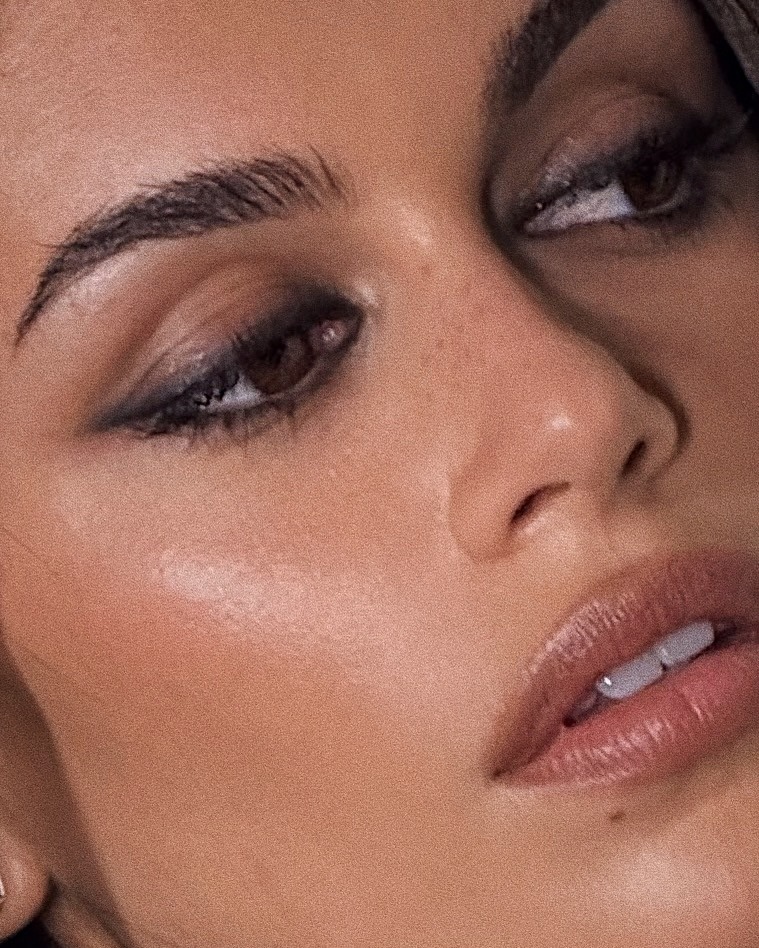 A close-up of Kaia Gerber's makeup with a soft smoky winged eyeliner look