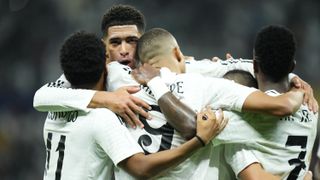 Real Madrid players hug in celebration