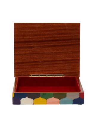 Wooden box with a geometrical colorful pattern exterior and golden finishings.