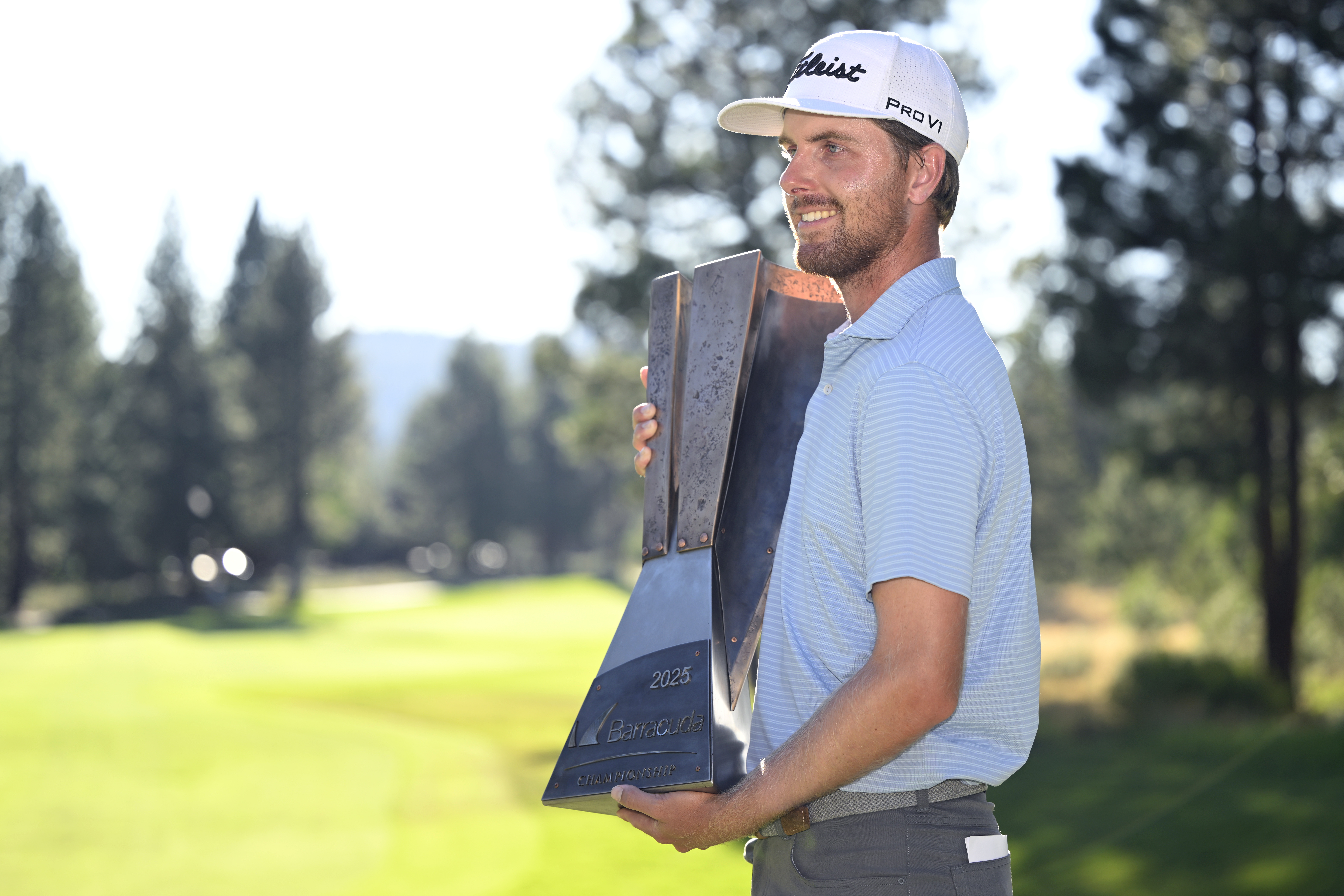 Ryan Gerard holds the Barracuda Championship trophy