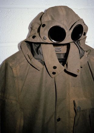 brown coat with goggles