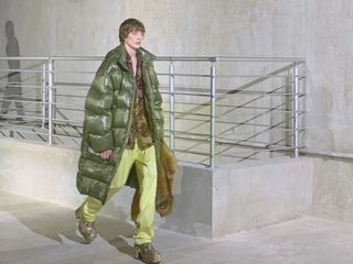 In a vast concrete industrial space, models stomped in glam rock platformboots to a soundtrack of panting breath