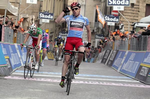 Cadel Evans (BMC) is victorious on a taxing uphill finish.
