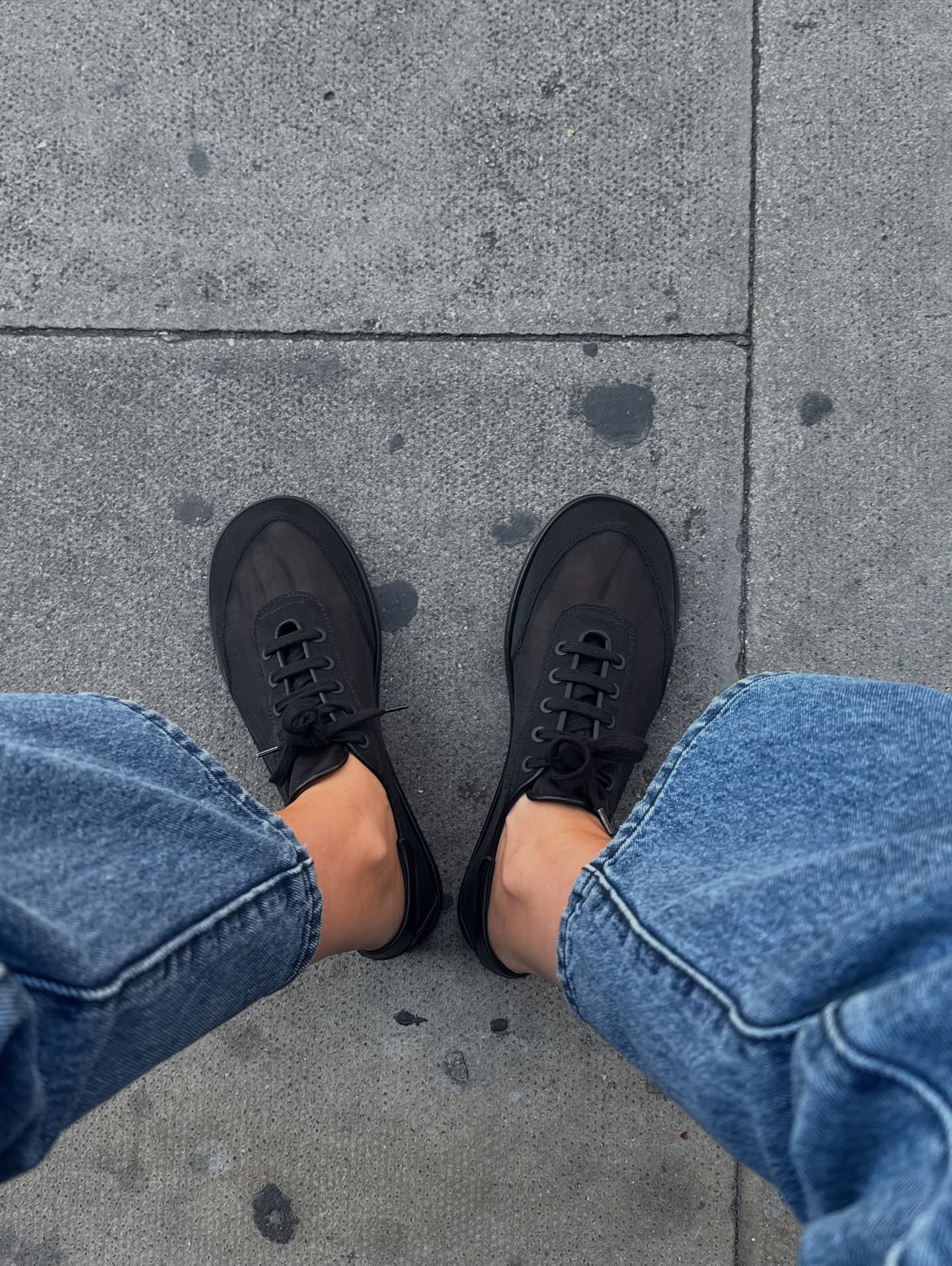An image of @lizzyhadfield showcasing the mesh trainer trend in a pair from Dear Frances.