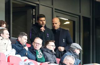 Mauricio Pochettino, centre, watches from the stand
