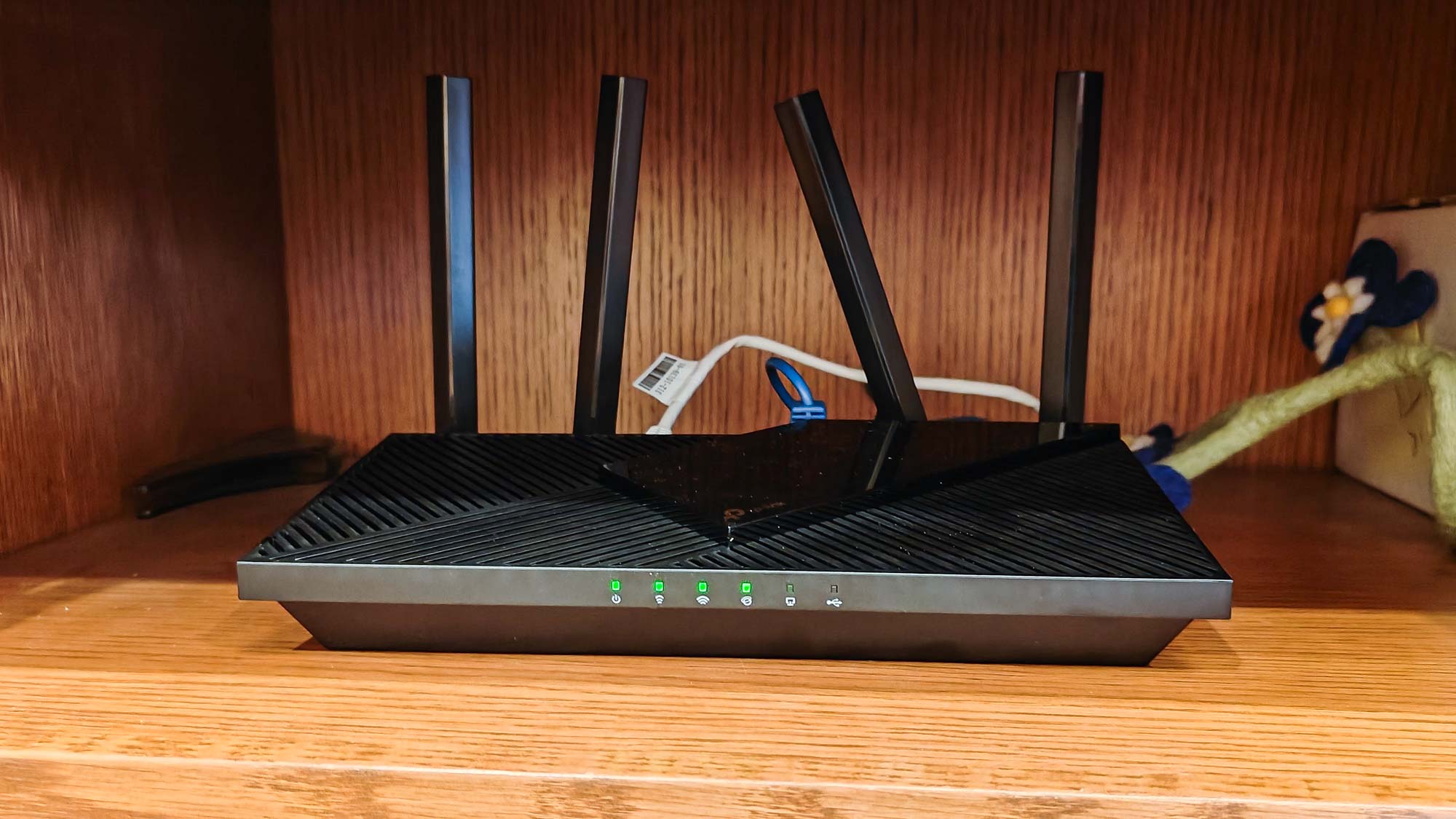 TP- Link Archer AX55 sitting on desk