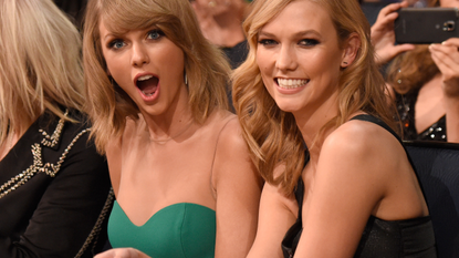 Karlie Kloss and Taylor Swift attend the 2014 American Music Awards at Nokia Theatre L.A. Live on November 23, 2014 in Los Angeles, California