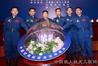 Six of China's already flown astronaut corps take part in ceremonies marking a naming contest for elements of their space station program.