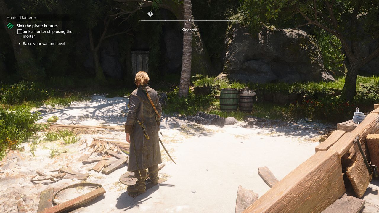 Black Flag treasure maps: Edward standing next to barrels and a hidden door in the cliffside of a beach.