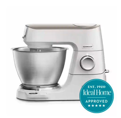A silver Kenwood mixer and bowl with a 5 stars Ideal Home approved blue badge