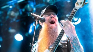 Porter McKnight sings and plays bass at an Atreyu gig
