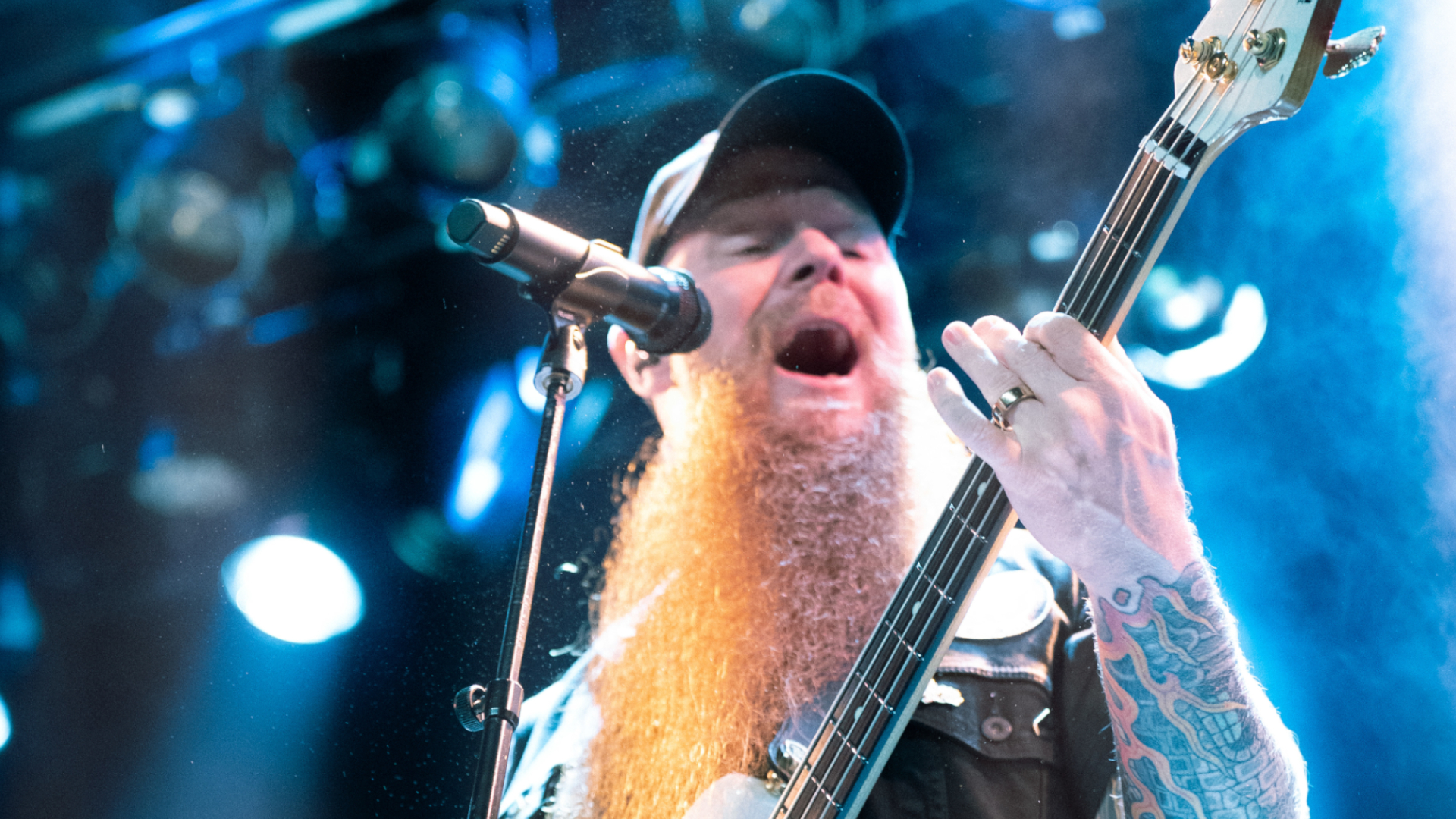 Porter McKnight sings and plays bass at an Atreyu gig