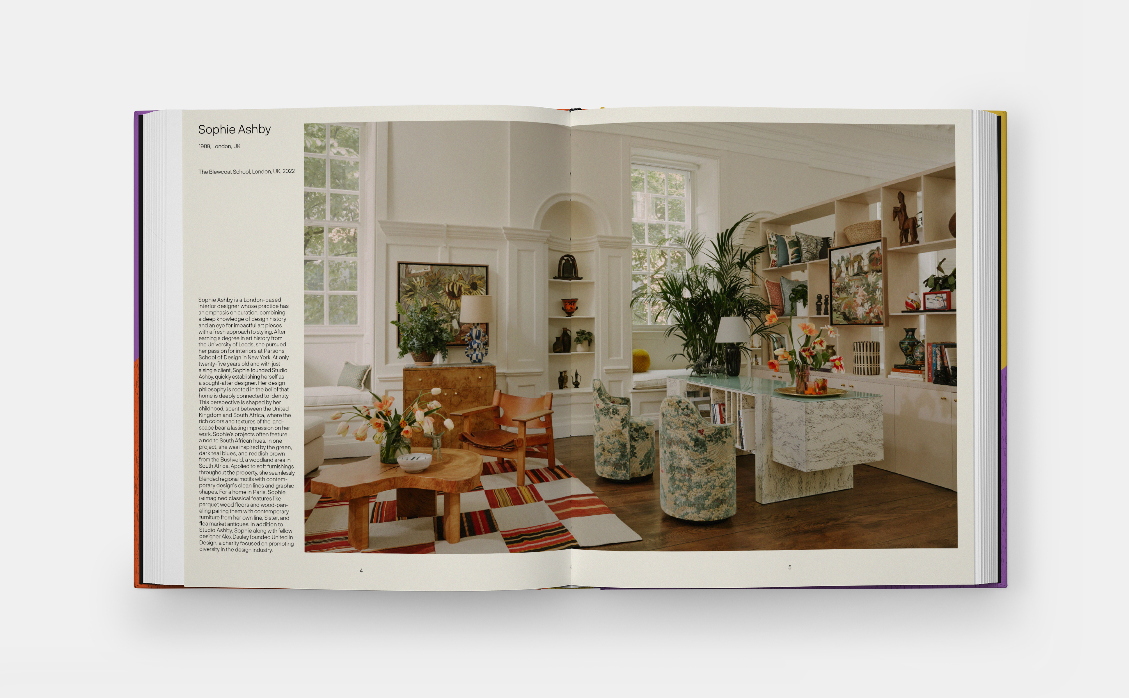Book spread featuring bright light-filled interior with colourful rugs, wooden furniture, pot plants and shelving