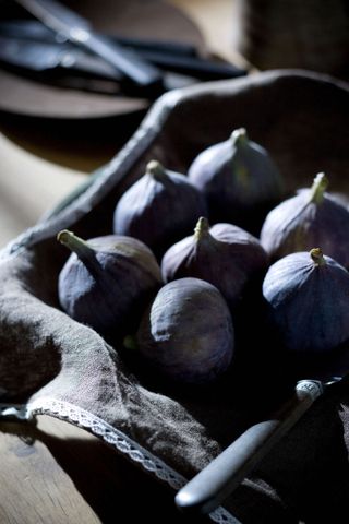 figs in a basket on table
