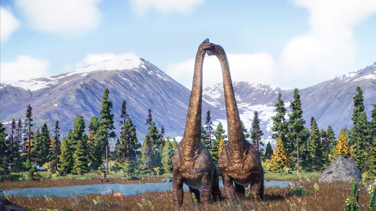 Two long-necked dinosaurs in a mountain landscape