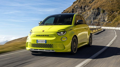 A yellow Abarth 500e car on the road