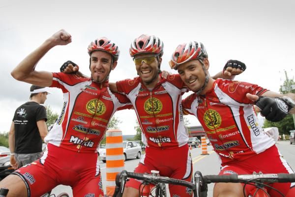 Stage 6 winner Hector Baeza Gonzalez (left) celebrates with teammates from Heraklio-Murcia Franciso Mancebo (right), and Jaume Rovira Pous.