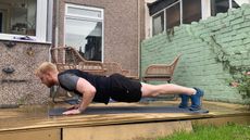 Fit&Well fitness writer Harry Bullmore performing a push-up