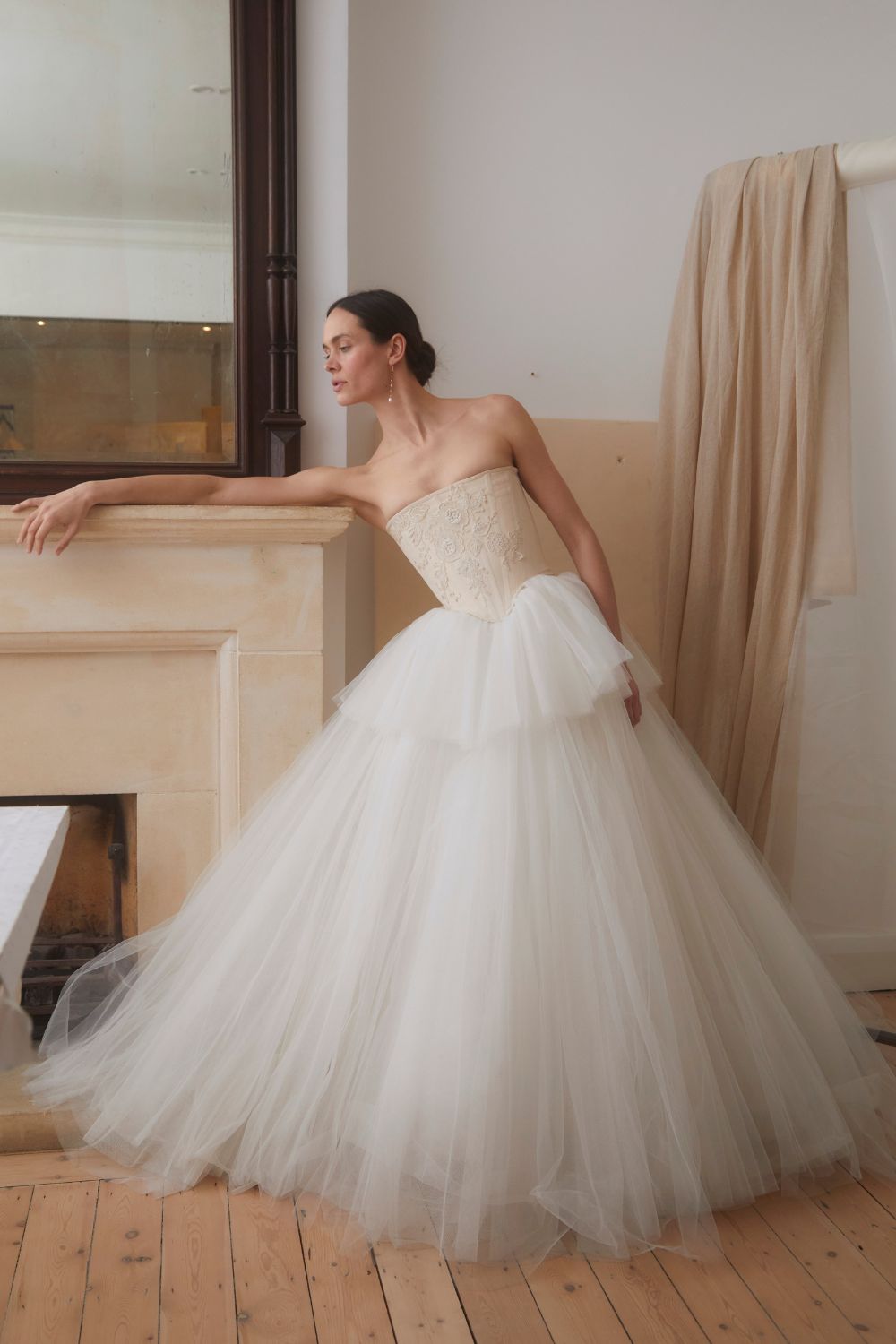 a model wears a halfpenny wedding dress