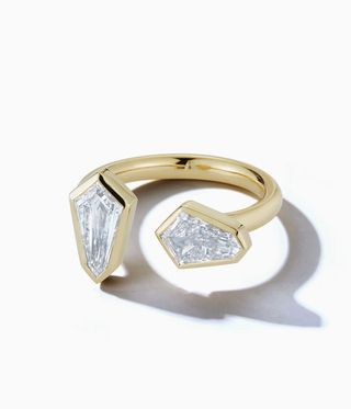 Jenny Klatt and Stephanie Wynne ring with two hexagonal shape diamonds at either ends.