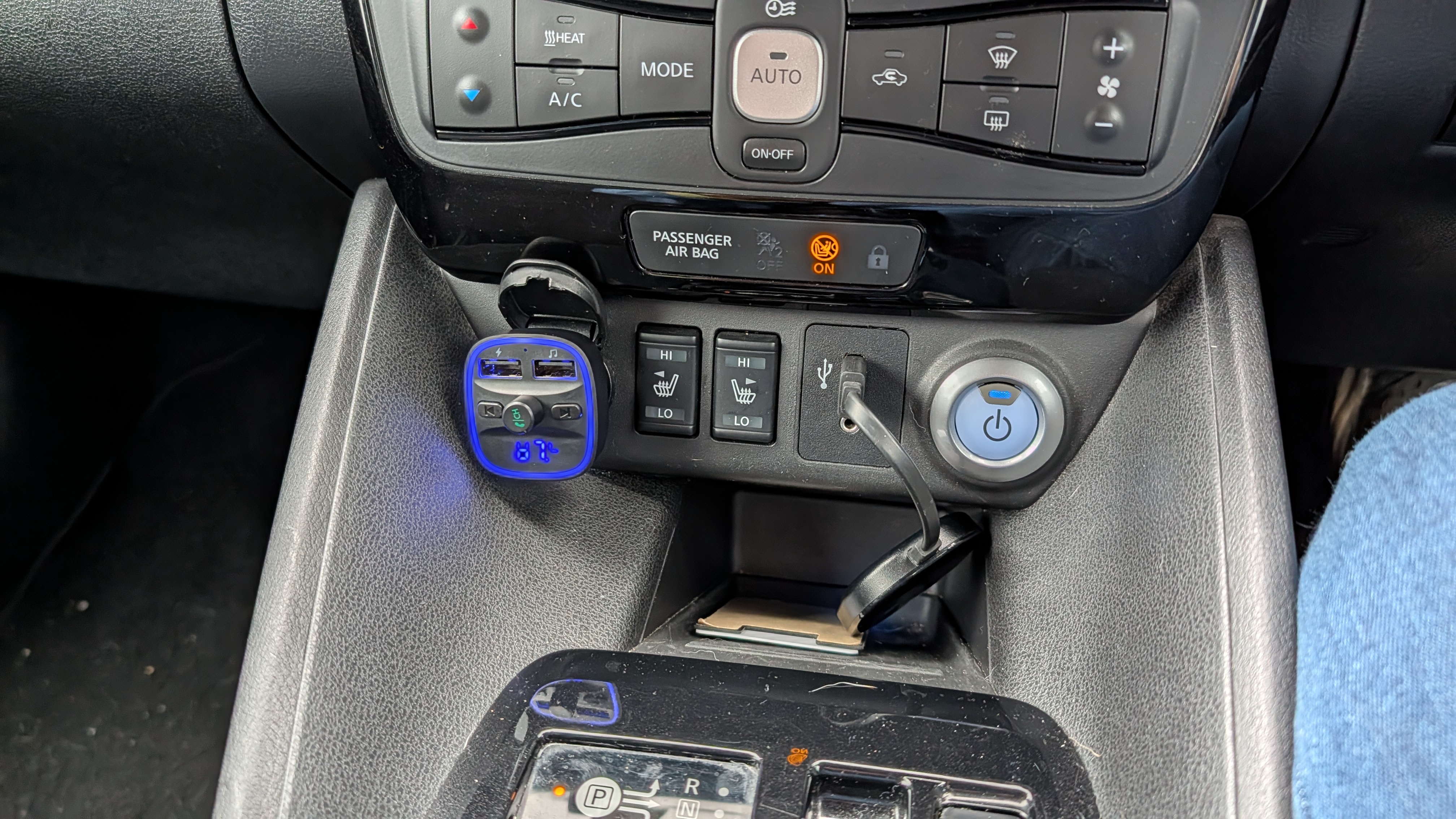 lencent fm transmitter inside a nissan leaf cockpit