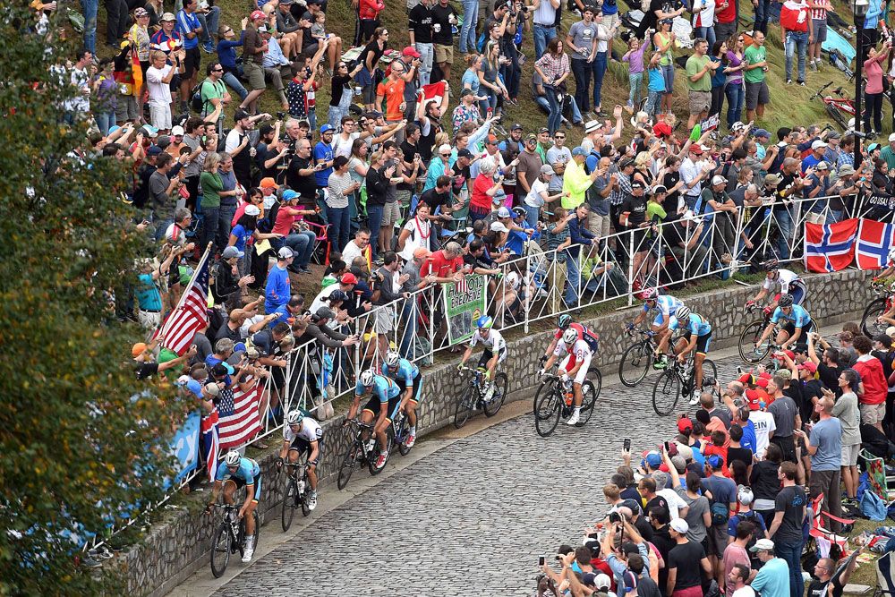 Riders use the smooth edges of the road on Libby Hill