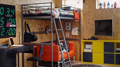 teenage boys' bedroom with chipboard walls and high sleeper