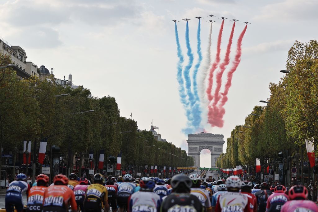 French air forces aerobatics demonstration unit Patrouille de France PAF performs as the pack rides on the Champs Elysees avenue with the Arc de Triomphe in the background during the 21st and last stage of the 107th edition of the Tour de France cycling race 122 km between ManteslaJolie and Champs Elysees Paris on September 20 2020 Photo by KENZO TRIBOUILLARD AFP Photo by KENZO TRIBOUILLARDAFP via Getty Images