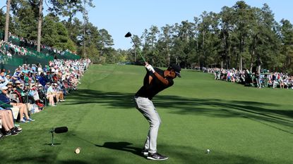 Tony Finau tees off on the 14th hole at Augusta National