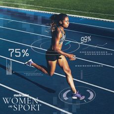 A woman sprinting on a track having her athletic ability researched and measured