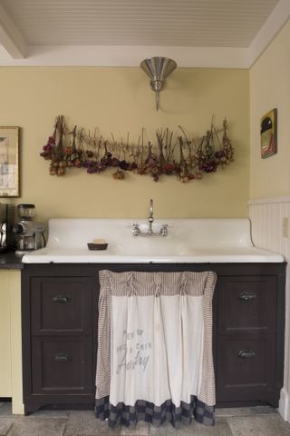 reclaimed sink in kitchen extension to 1700s new england farmhouse