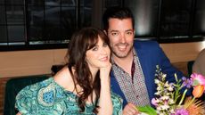 zooey deschanel and jonathan scott at a dinner