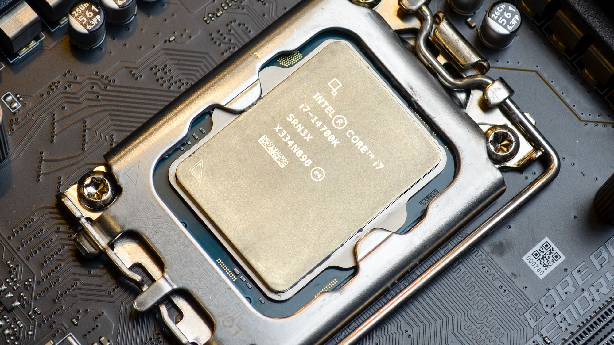 An Intel Core i7-14700K slotted into a motherboard