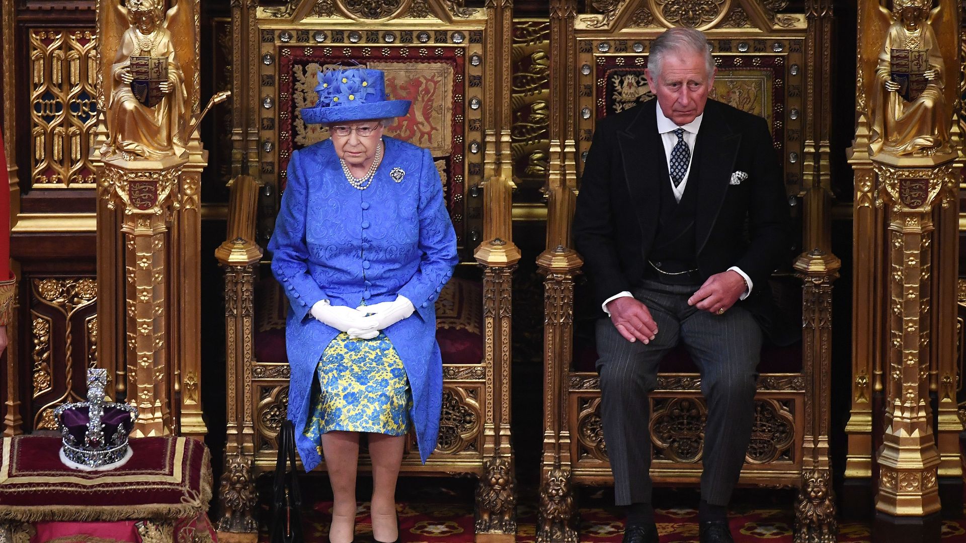 Queen Elizabeth II and King Charles arrive in the House of Lords for the State Opening of Parliament in 2017