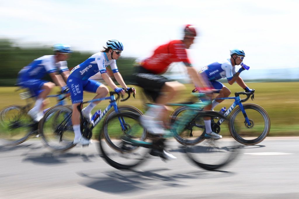 The pack rides during the third stage of the 75th edition of the Criterium du Dauphine cycling race 1945 kms between MonistrolSurLoire and Le Coteau centraleastern France on June 6 2023 Photo by AnneChristine POUJOULAT AFP Photo by ANNECHRISTINE POUJOULATAFP via Getty Images