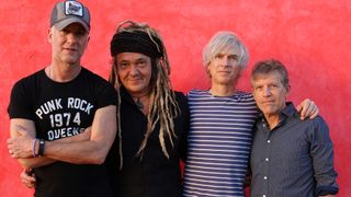 Nada Surf pose in 2024 for their album 'Moon Mirror.' (from left) Ira Elliot (drums), Daniel Lorca (bass), Matthew Caws (guitar and vocals) and Louie Lino (keyboards)