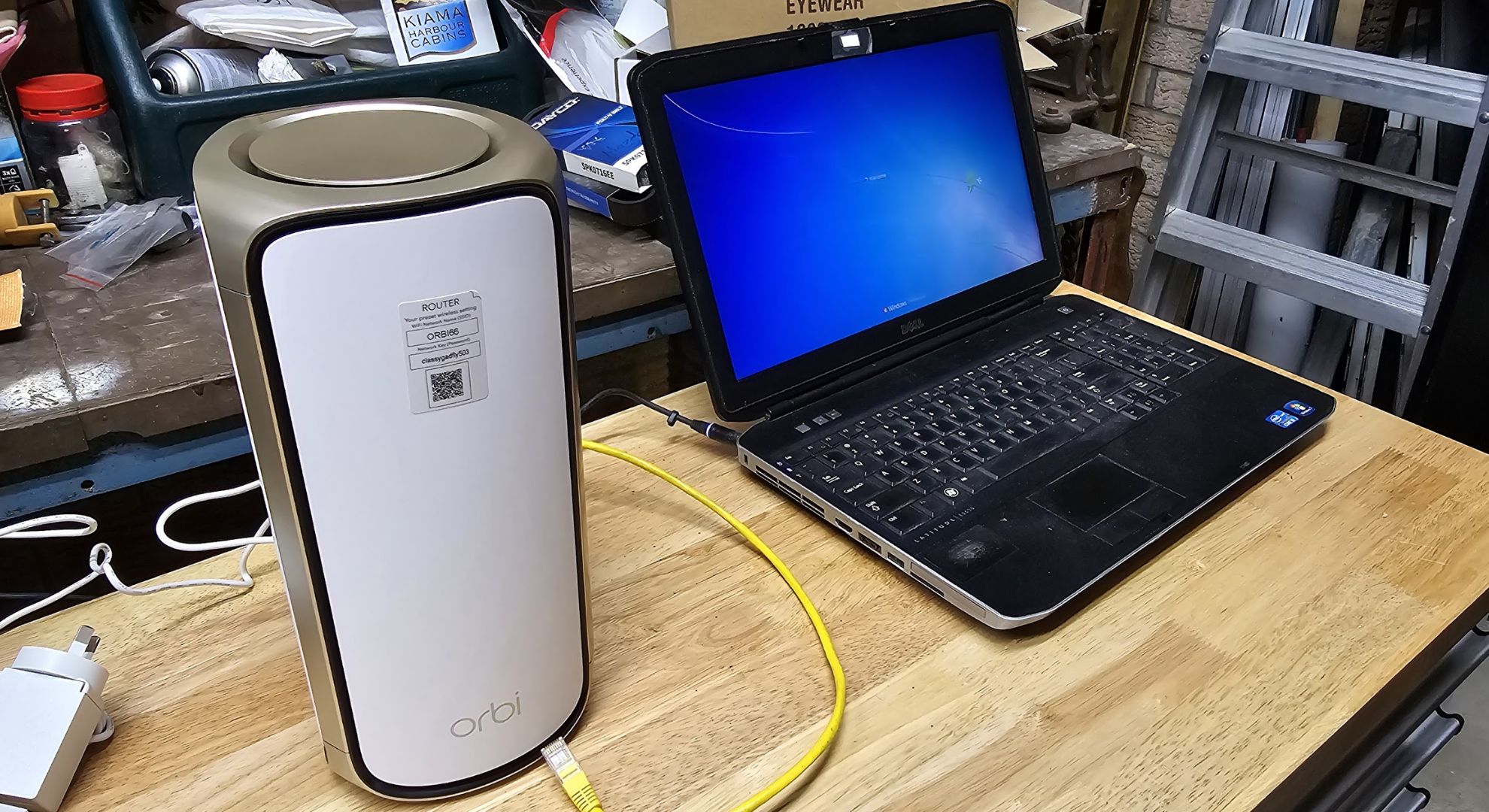 A Netgear Orbi 970 being set up with a laptop