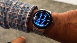 The At a Glance feature on the Google Pixel Watch 5, showing the current Google Maps route ETA