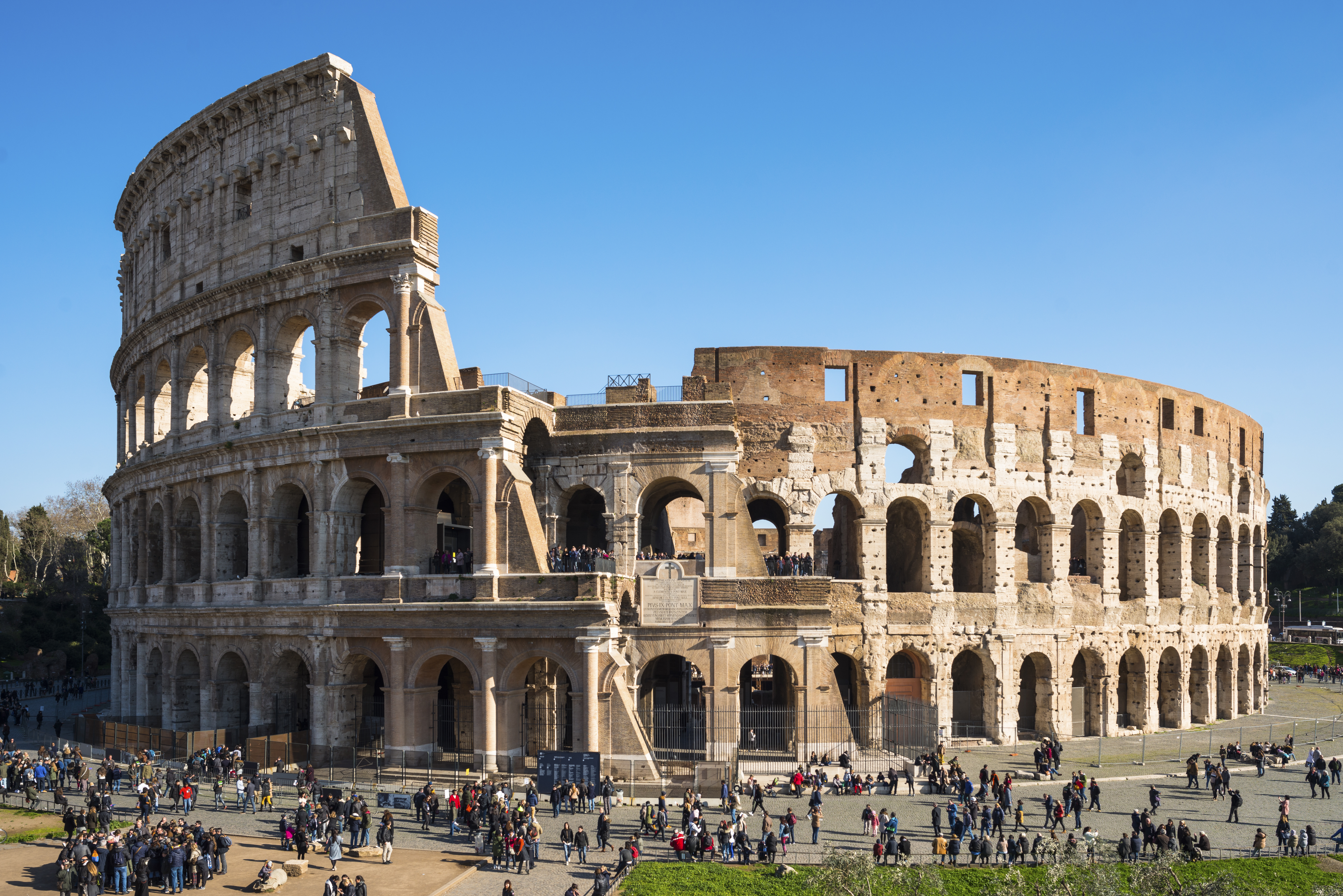 The Colosseum in Rome surrounded by tourists